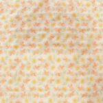 tela efecto seersucker florecitas naranjas y amarillas