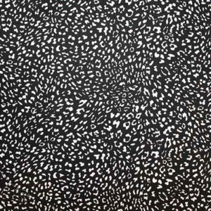 Tela Viscosa Fondo Negro con Manchas Blancas Animal Print